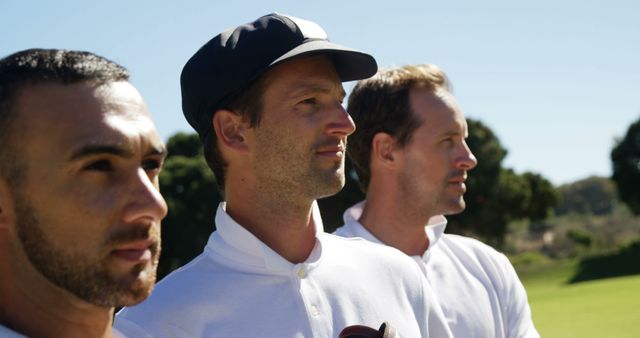 Confident Male Athletes Standing on Golf Course in White Polo Shirts - Download Free Stock Images Pikwizard.com