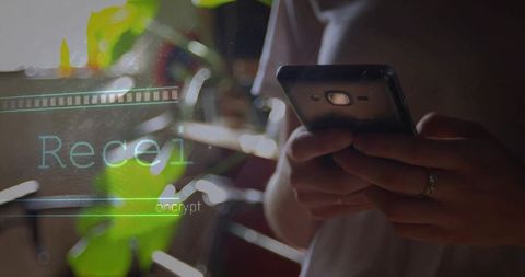 Woman Tapping Smartphone Screen by Sunlit Window, Gracefully Holding Device