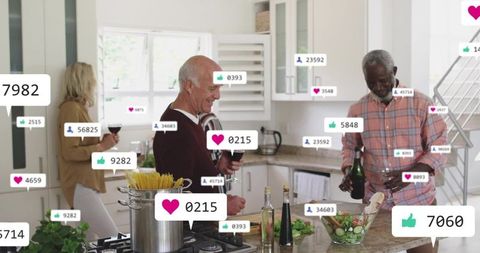 Adults cooking and pouring wine in modern kitchen with floating social media like notifications