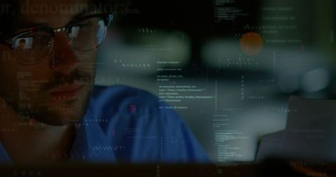Night coder gazing at monitor, glasses reflecting code, keyboard, cinematic workspace
