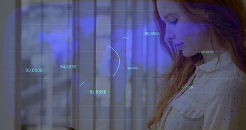 Holding smartphone woman scrolling in office with hud analytics overlay and world map