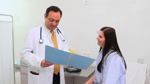 Healthcare Professional Consulting Smiling Patient