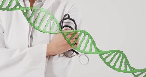 Medical professional with dna strand hologram conceptualizing genetic research
