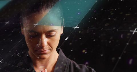 Martial Artist with Tech Overlay Symbolizing Modern Competition