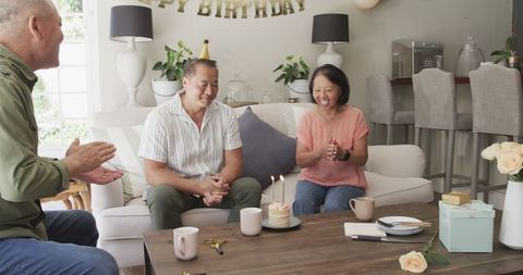 Cheerful Birthday Celebration with Seniors in Cozy Living Room