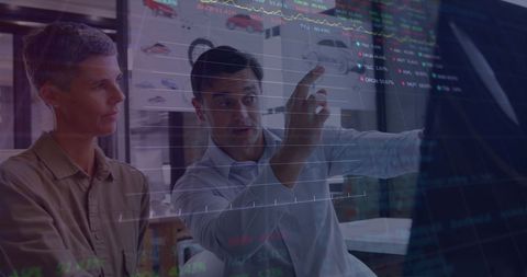 Engineers Analyzing Data with Car Models and Stock Market Graphs - Download Free Stock Images Pikwizard.com