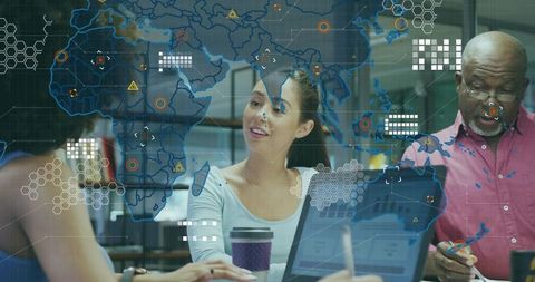 Global Collaboration Team Analyzing Digital Data in Modern Office