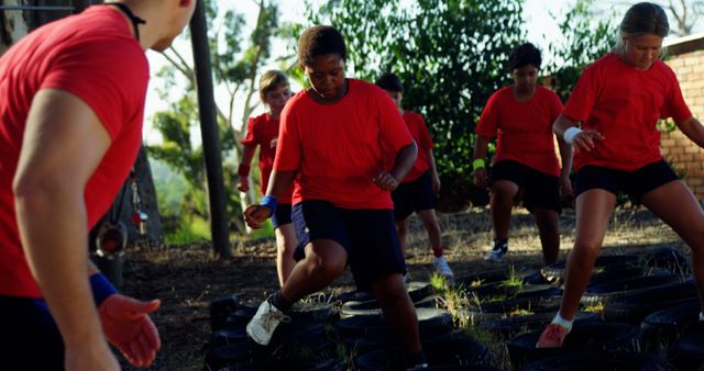 Teenagers Participating in Outdoor Military-Style Obstacle Course - Download Free Stock Images Pikwizard.com