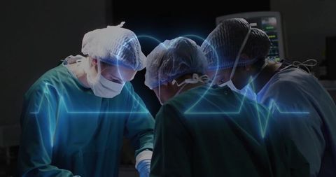 Surgical team in operation theater with holographic ecg display