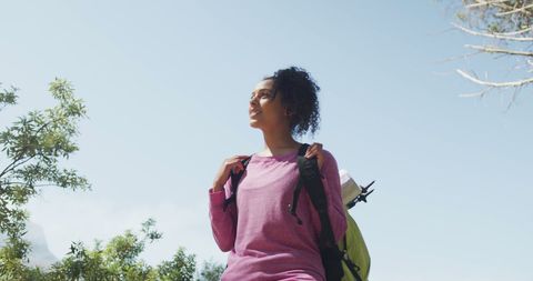 Smiling Woman Hiking in Scenic Nature with Backpack - Download Free Stock Images Pikwizard.com