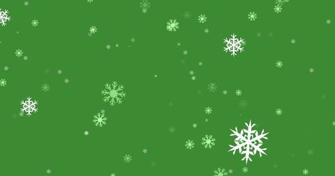 Snowflakes Falling Against Green Festive Background