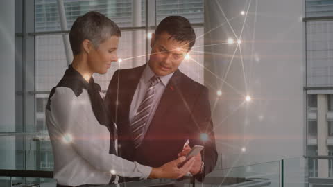 Diverse Business Duo Exploring Digital Connections