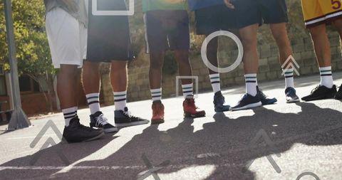 Basketball team unity on outdoor court in stylish activewear