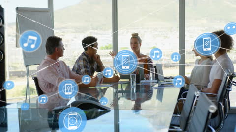 Business Executives Talking Technology in Modern Office