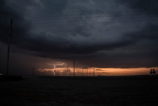 Dramatic Thunderstorm with Lightning Striking at Sunset - Download Free Stock Photos Pikwizard.com