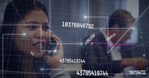 Business Woman Discussing Data Over Smartphone in Modern Office