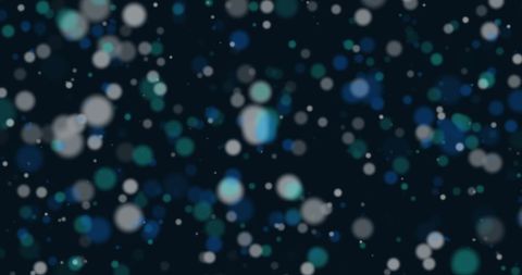 Illuminated Bokeh Spots on Dark Background