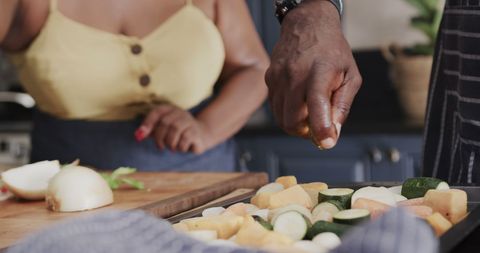 Senior African American Couple Cooking Together at Home