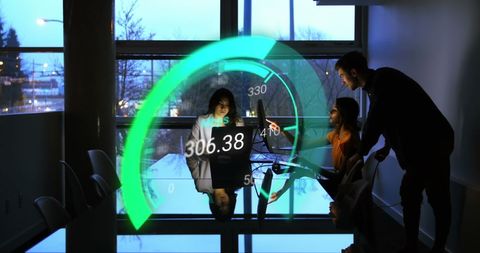 Diverse Team Analyzing Hi-Tech Data with Speedometer Overlay - Download Free Stock Images Pikwizard.com