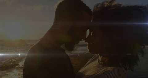 Silhouette of Couple Embracing Together