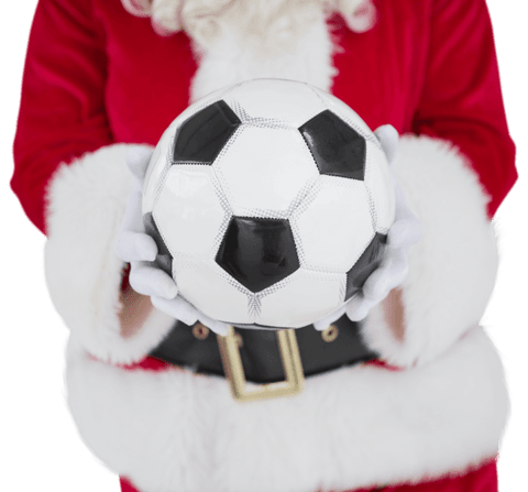 Transparent santa holding black and white soccer ball announces festive athletics