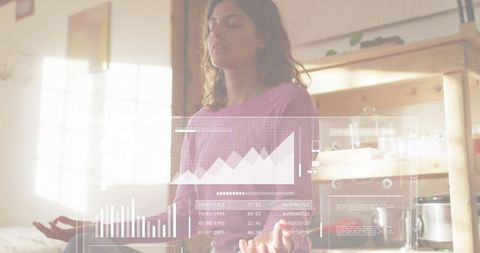 Sunlit woman meditating with digital hud wellness overlays for mindful living