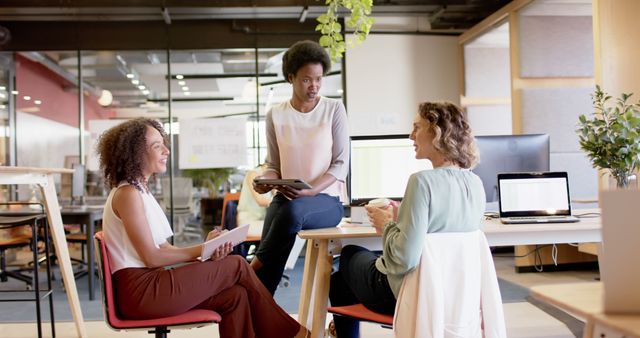 Diverse coworkers in modern office having productive meeting - Download Free Stock Images Pikwizard.com