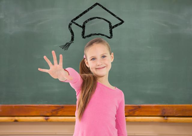 This image depicts a young schoolgirl standing in front of a chalkboard with a drawn graduation cap above her head. She is smiling and holding up four fingers, suggesting confidence and achievement. This image can be used for educational content, school promotions, academic success stories, and creative learning materials.