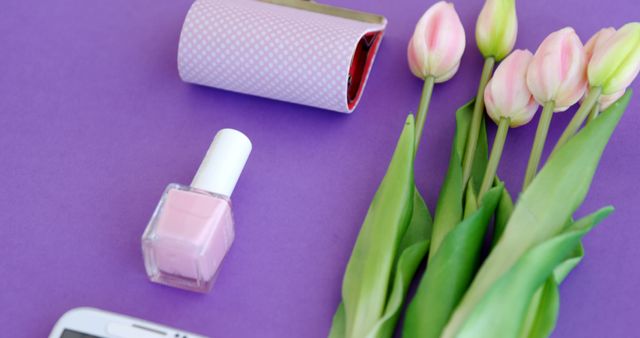 Pink Nail Polish Bottle with Tulips on Purple Background - Download Free Stock Images Pikwizard.com