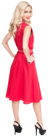 Attractive blonde in red dress posing with confidence