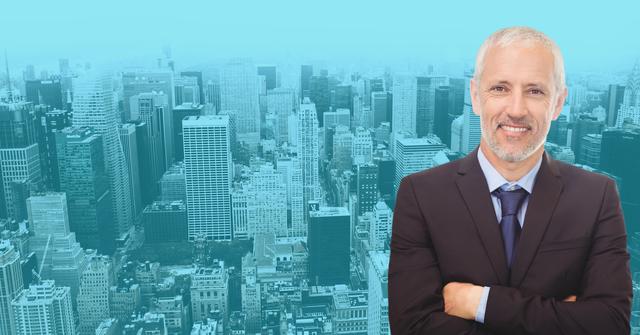 Mature businessman standing confidently in front of a cityscape with arms crossed, showcasing professionalism and success. Ideal for use in corporate websites, business promotions, executive profiles, or financial services advertisements.