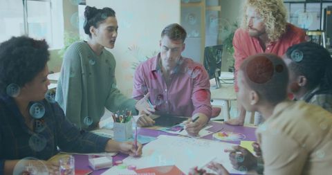 Diverse Team Discussing Bitcoin and Business Strategies in Office