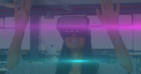 Biracial Woman Experiencing Virtual Reality in Office Environment