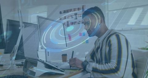 Developer inspecting augmented reality data overlay on laptop at modern workstation