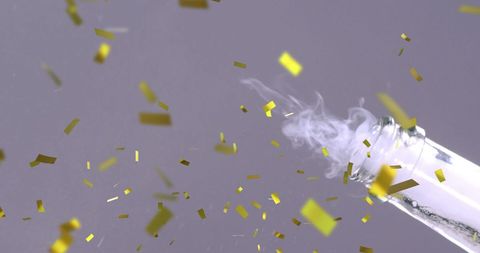 Champagne Bottle Popping with Gold Confetti Celebration