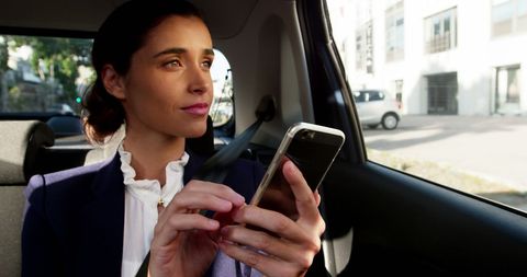 Businesswoman Using Mobile Phone in Car - Download Free Stock Images Pikwizard.com