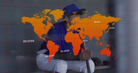 Baseball Player Analyzing Game Strategy with Digital Map