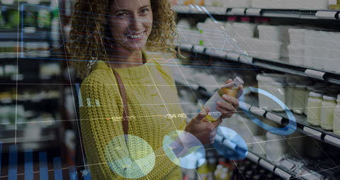 Woman Holding Juice Bottle with Overlay of Data Trends