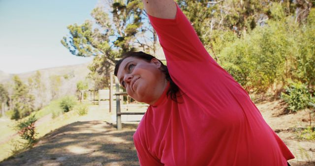 Woman Stretching Outdoors in Park for Exercise - Download Free Stock Images Pikwizard.com