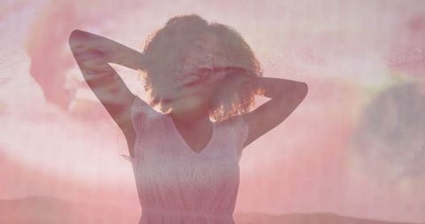 Tranquil Woman in Lace at Sunset with Pastel Ethereal Backdrop