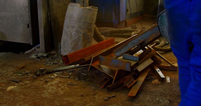 Messy Industrial Workshop with Metal Beams and Tools on Floor - Download Free Stock Images Pikwizard.com