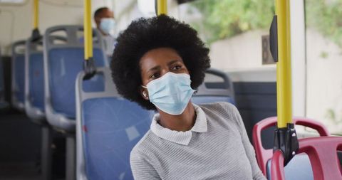 Businesswoman in Mask Riding City Bus During Pandemic - Download Free Stock Images Pikwizard.com