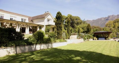 Beautiful House with Garden and Mountain View on Sunny Day