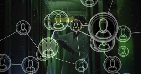 Korean Technician Analyzing Networks in Data Center with Connected Icons