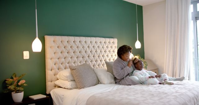 Mother and Daughter Enjoying Morning in Cozy Bedroom - Download Free Stock Images Pikwizard.com