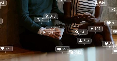 Friends Connecting Over Coffee Amid Digital Notifications