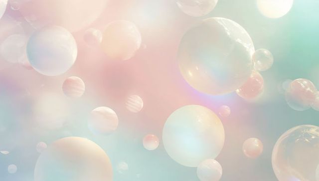 Iridescent Glass Orbs Floating Over Pastel Gradient Soft Glow Dreamy Abstract Bokeh