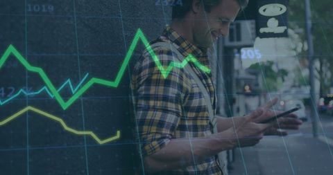 Man using smartphone amidst digital financial analytics