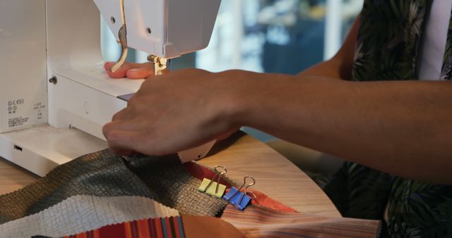 Person Sewing Fabric Using Sewing Machine - Download Free Stock Images Pikwizard.com