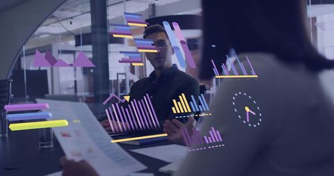 Colleagues Analyzing Financial Data with Digital Graphs Overlay